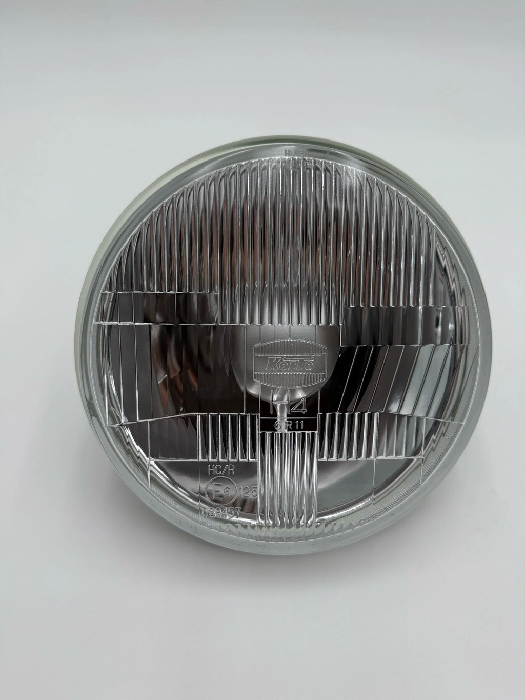 Round 7in. headlight for BMW 2002 on a white background