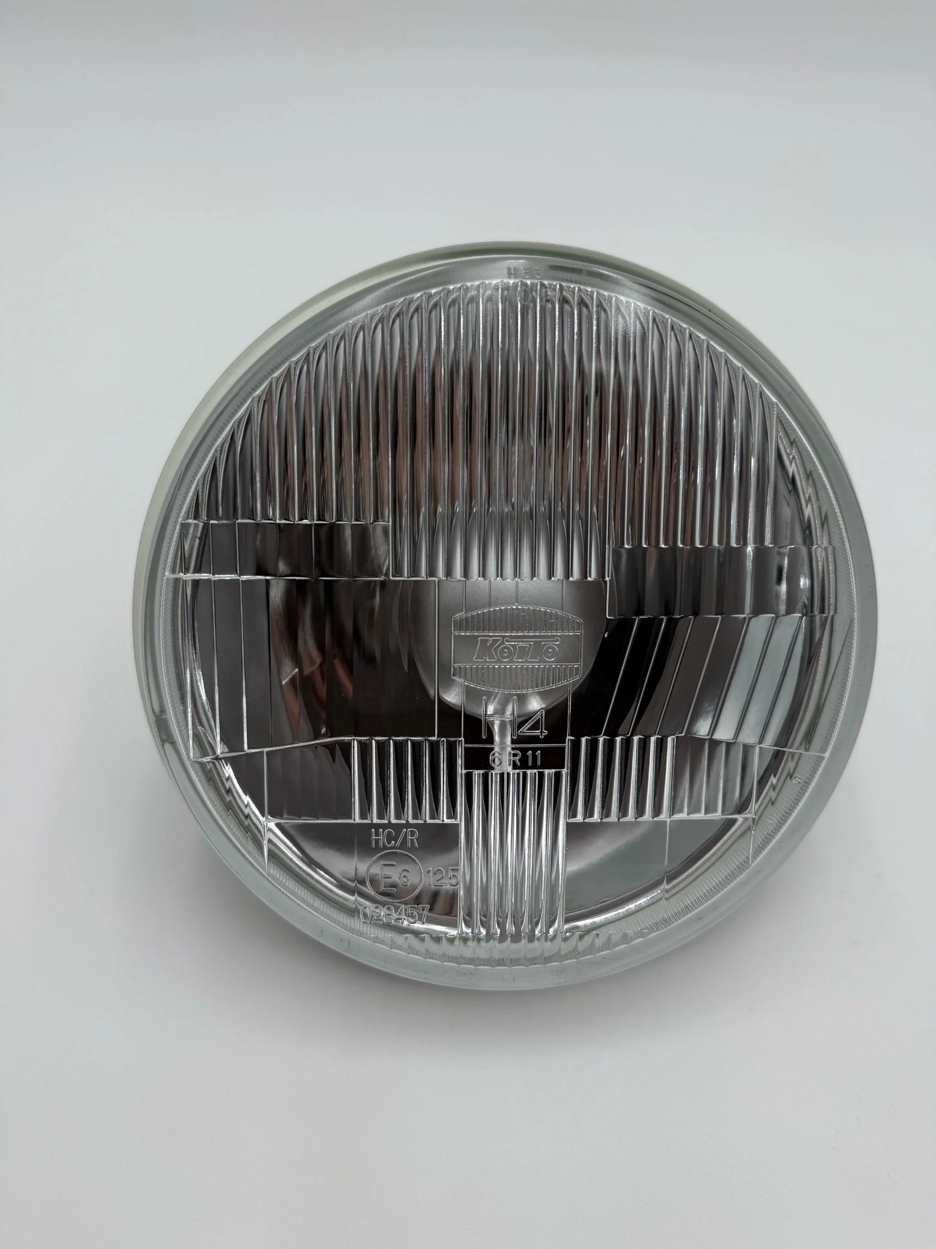 Round 7in. headlight for BMW 2002 on a white background