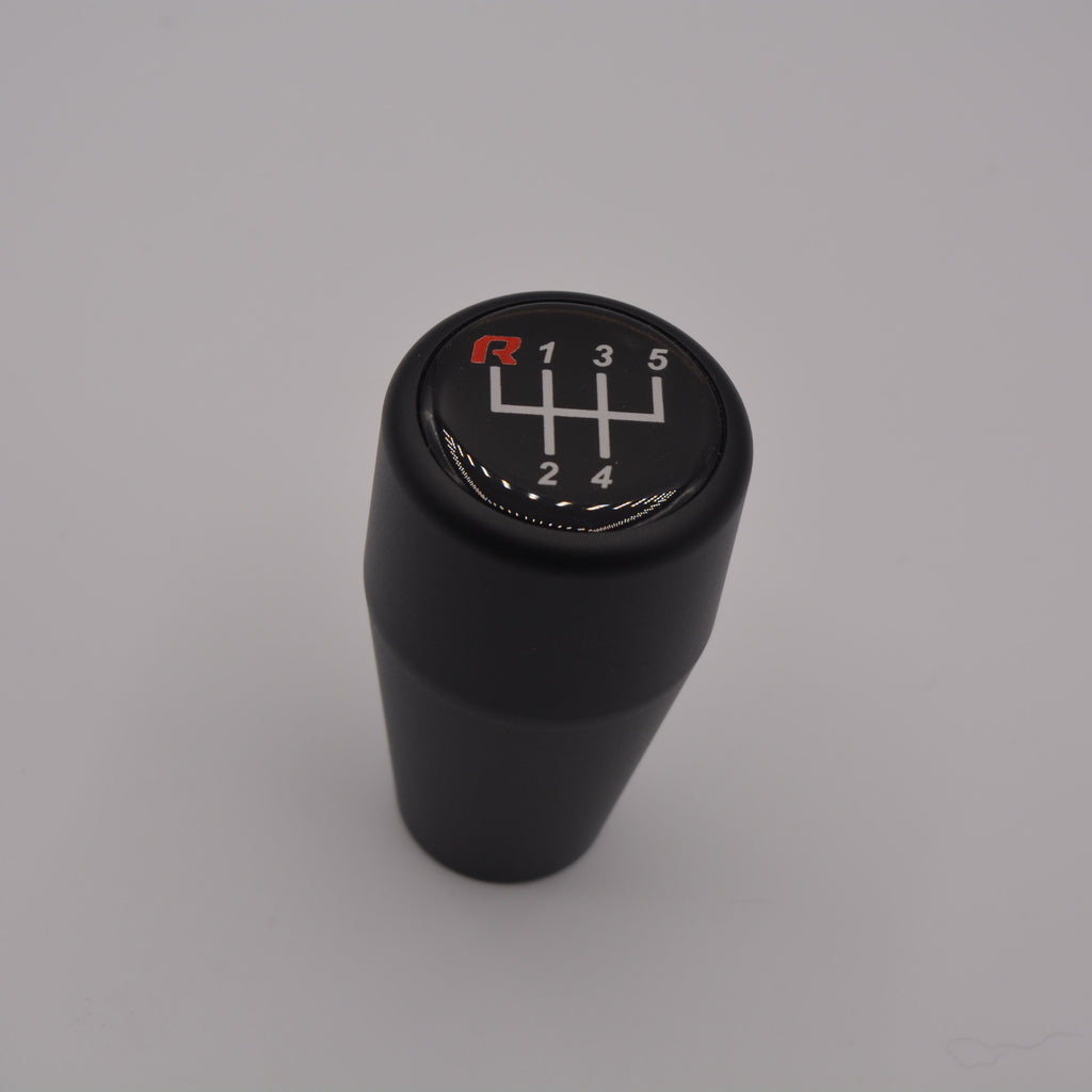 HRB black gear shift knob with 5-speed markings on a gray background