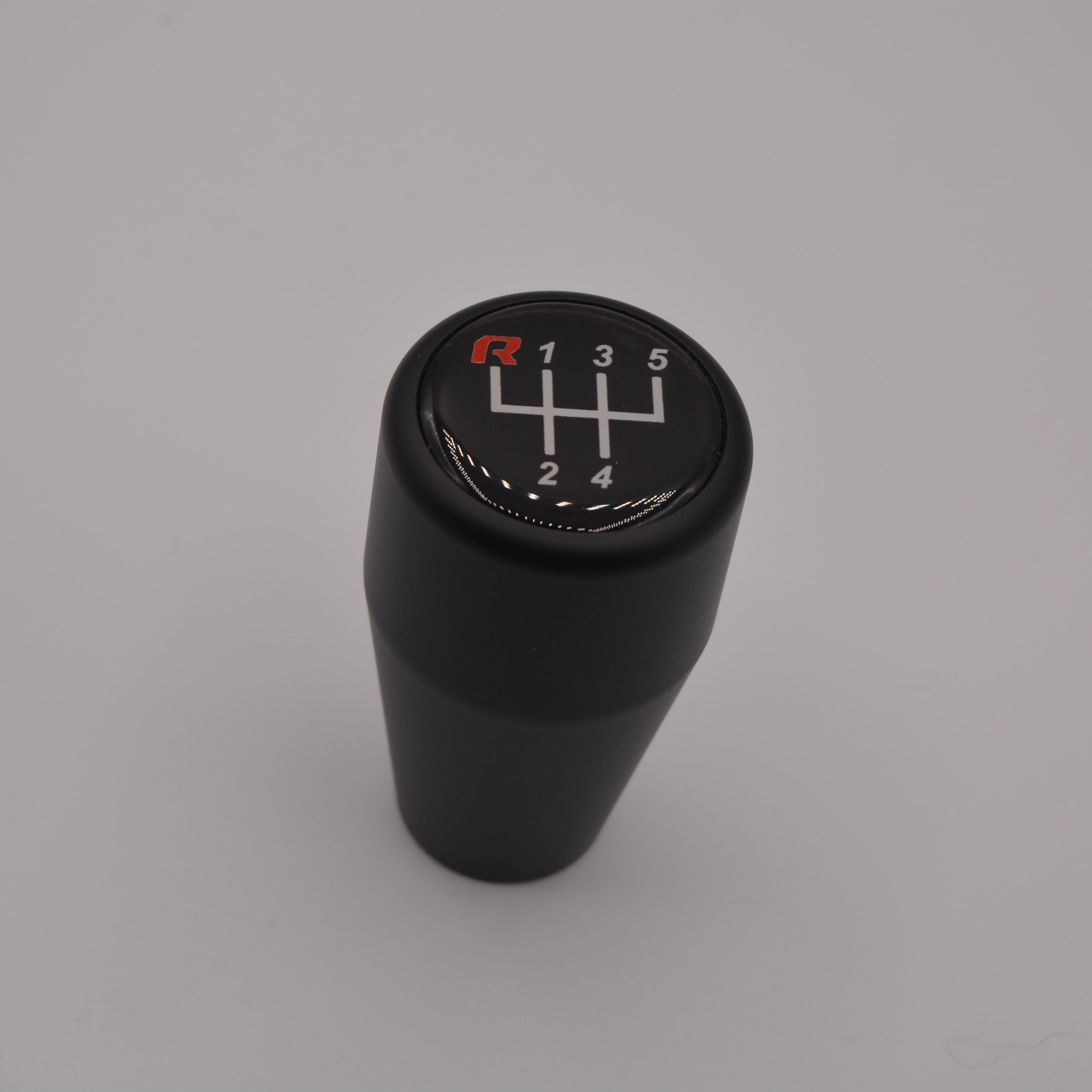 HRB black gear shift knob with 5-speed markings on a gray background