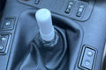 BMW gear shift lever with a white adapter