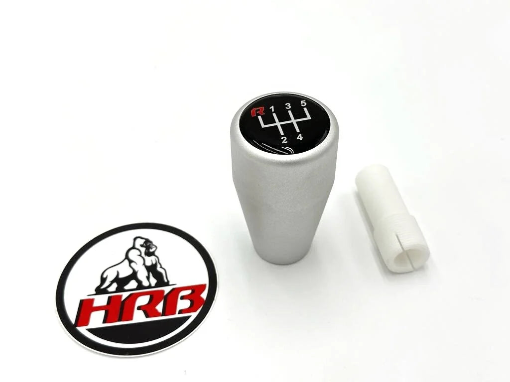 Silver BMW shift knob with 'HRB' logo on a white background