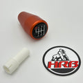 BMW gear shift knob with a white boot and HRB logo on a gray background