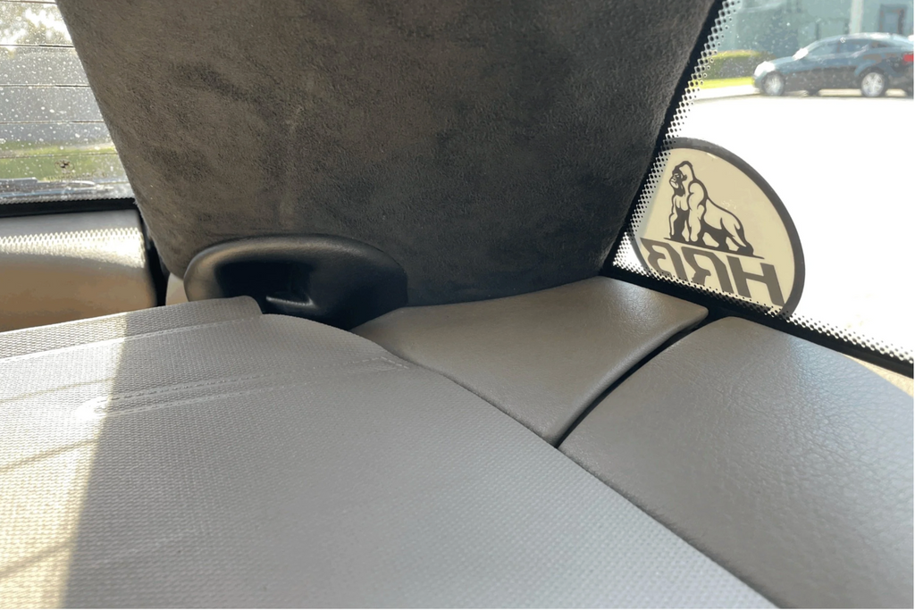 Car interior with a gray headliner and HRB Z3 Coupe Roller Blind Brackets