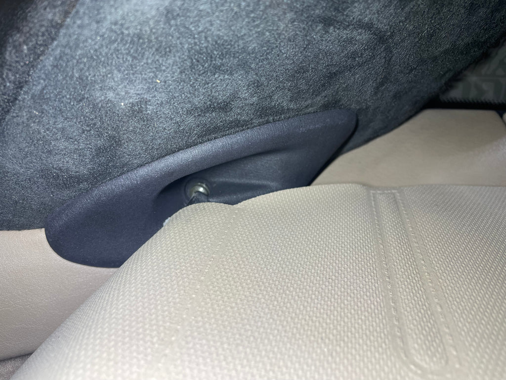 Close-up of car seat with HRB Z3 Coupe Roller Blind Brackets