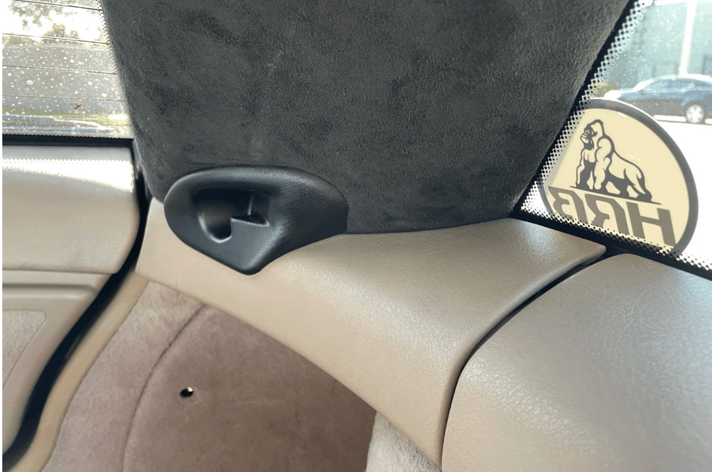 Car interior with an HRB Z3 Coupe Roller Blind Bracket
